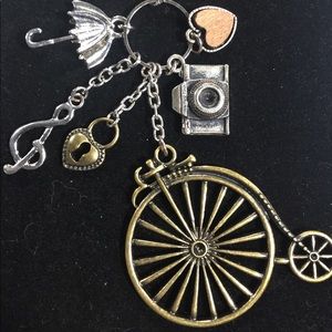 Long necklace Bike, heart and other charms